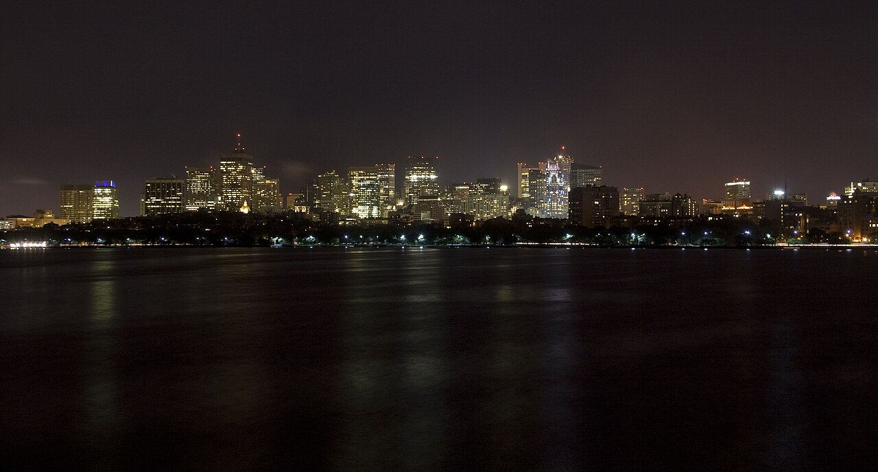 Boston skyline at night from the water